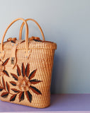 Straw Rattan tote bag embellished with a brown flowers