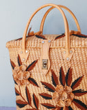 Straw Rattan tote bag embellished with a brown flowers