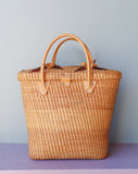 Straw Rattan tote bag embellished with a brown flowers
