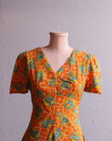 1970's Orange psychedelic floral mini dress.