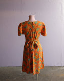 1970's Orange psychedelic floral mini dress.