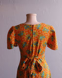 1970's Orange psychedelic floral mini dress.