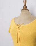 1980-90's Diane Von Furstenberg Yellow short sleeve knit top with corset lacing