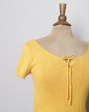 1980-90's Diane Von Furstenberg Yellow short sleeve knit top with corset lacing