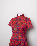 1970's Red shortsleeve poly mini dress with a psychedellic blue and green print