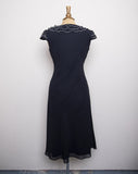 1990's-Y2K Black bias cut cocktail dress with a white trim ruffled bodice