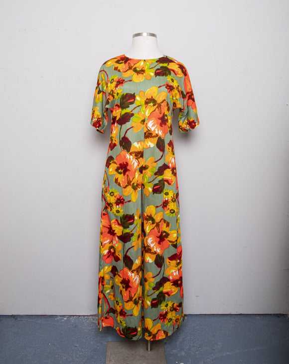 1970's Sage Green Hawaiian Jumpsuit with orange & yellow tropical florals