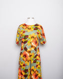 1970's Sage Green Hawaiian Jumpsuit with orange & yellow tropical florals