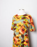 1970's Sage Green Hawaiian Jumpsuit with orange & yellow tropical florals