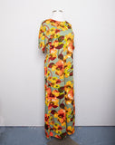 1970's Sage Green Hawaiian Jumpsuit with orange & yellow tropical florals