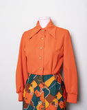1970's  Orange polyester long sleeve psychedelic mini dress