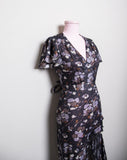 1970's Grey floral polyester wide leg jumpsuit with capelet sleeves