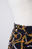 1990's Black highwaisted skirt with a pearl and gold chain print and pockets