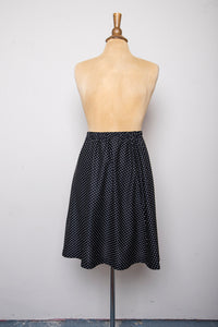 Black Polk dot mini skirt