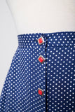 1990's Navy blue polka dot plus size button down skirt with red statement buttons