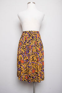 1990's Gold & Black animal print plus size skirt with medallion & tassle print.