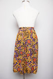 1990's Gold & Black animal print plus size skirt with medallion & tassle print.