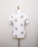 1970's White short sleeve button down shirt with a novelty print of dancing tuxedo guys