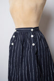 1990's Black skirt with white stripes and pockets