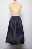 1990's Black skirt with white stripes and pockets