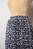 1990's Black & White daisy pleated broom skirt