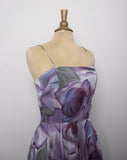 1970's sheer Sleeveless Purple floral dress with layered handkerchief hem