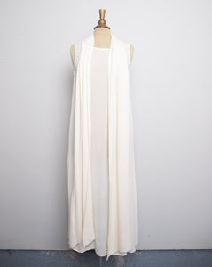 Ivory sheer sleeveless silk maxi dress with an attached duster vest