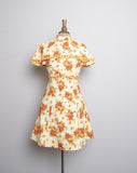 1970's Yellow floral mini dress with attached layered capelet