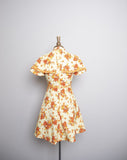 1970's Yellow floral mini dress with attached layered capelet