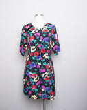 1990's Black short sleeve Plus size Romper with multicolor florals