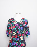 1990's Black short sleeve Plus size Romper with multicolor florals