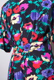 1990's Black short sleeve Plus size Romper with multicolor florals