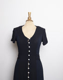 1990's Black short sleeve button down midi dress with pearl buttons and front slit