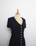 1990's Black short sleeve button down midi dress with pearl buttons and front slit