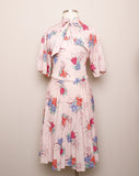 1970's Sheer Blush Pink tropical floral 3/4 sleeve, accordion pleated dress with pussy bow tie