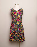 1990's Black sleeveless drop waist dress with yellow, navy and fuchsia florals