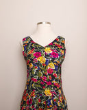 1990's Black sleeveless drop waist dress with yellow, navy and fuchsia florals