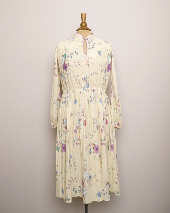 1970's Sheer Ivory accordion pleated long sleeve dress with purple & blue florals and mandarin collar key hole