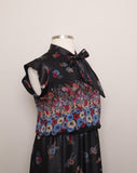 1970's Black floral dress with a pleated skirt & blouson top