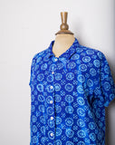 1990's Blue short sleeve button down shirt with abstract swirl sunflower print