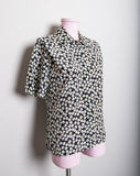 1990's Black short sleeve button down with a dainty daisy print