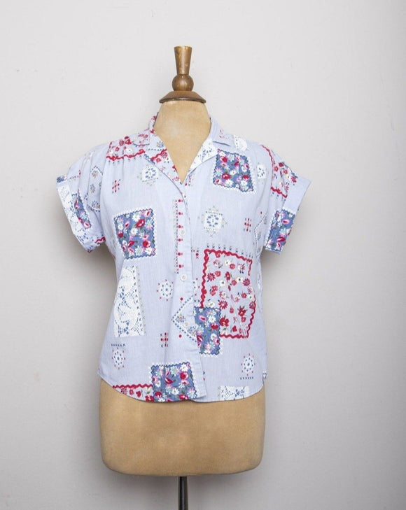 1980-90's Sky Blue short sleeve button down shirt with a floral red, blue and white quilt patchwork print