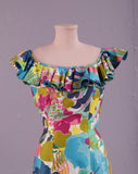 1950's Absolutely beautiful Hawaiian watercolor floral print dress with mermaid skirt.