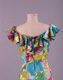 1950's Absolutely beautiful Hawaiian watercolor floral print dress with mermaid skirt.