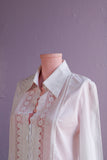 1990's White zip front top w/bell embroidered sleeves