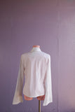 1990's White zip front top w/bell embroidered sleeves